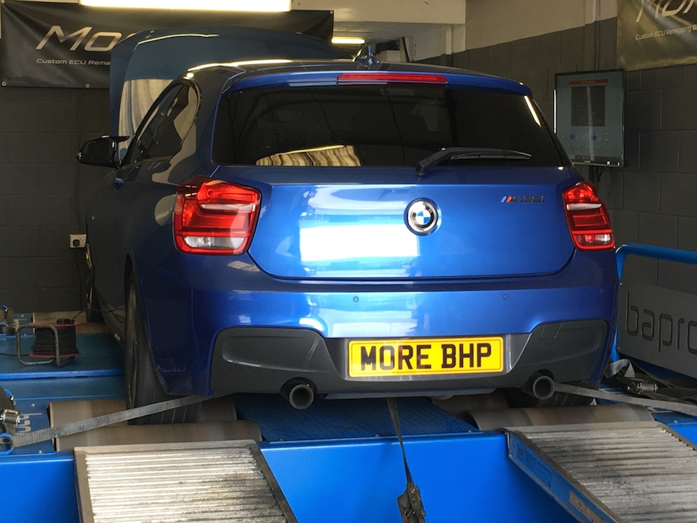 A BMW M135i being remapped on the MoreBHP rolling Road in Crewe